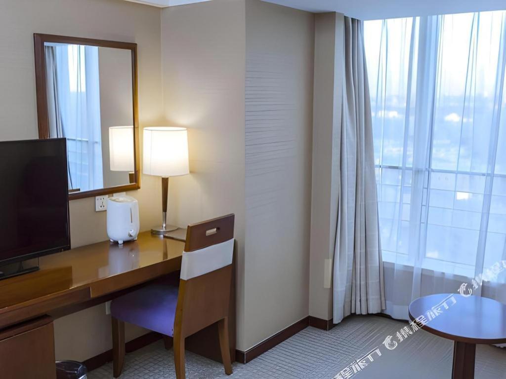 Dong Fang Hotel Beijing Bagian luar foto
